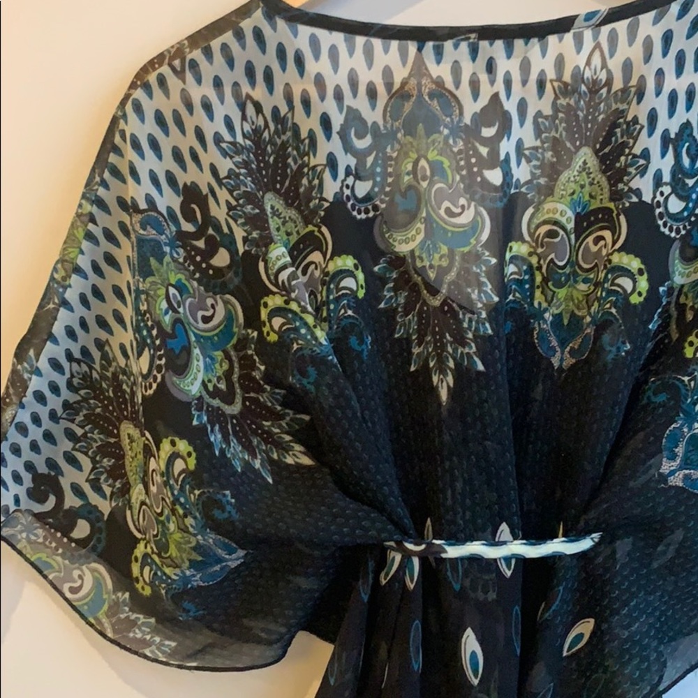 Peacock Poncho Urban Behavior